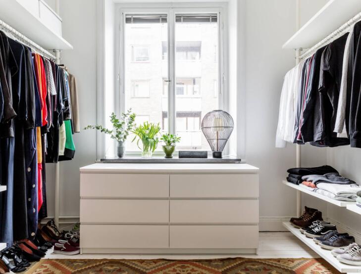 minimalist walk in closet design with dresser